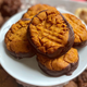 Close-up of Chocolate Thai Peanut Butter Cookies on a white plate
